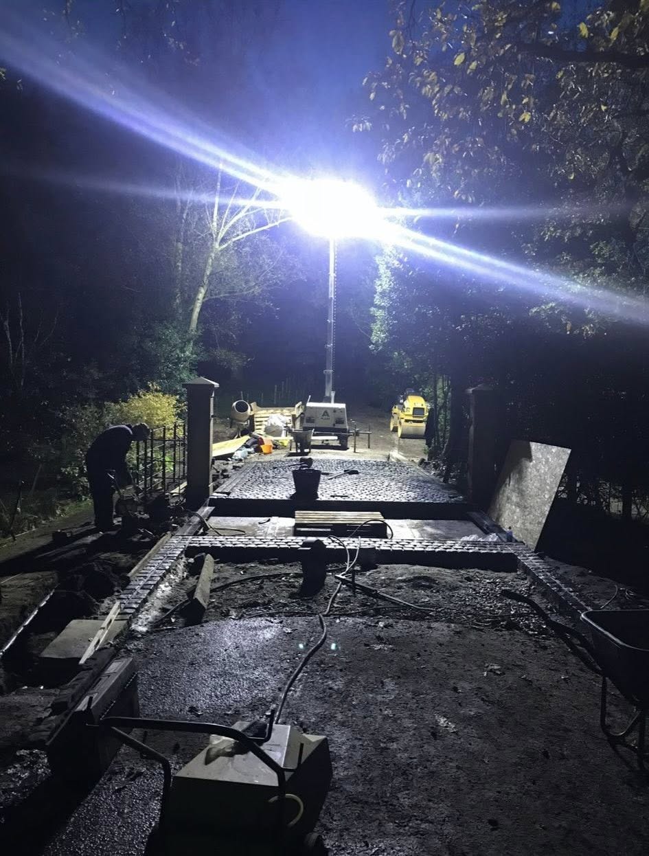 Night construction works under floodlights